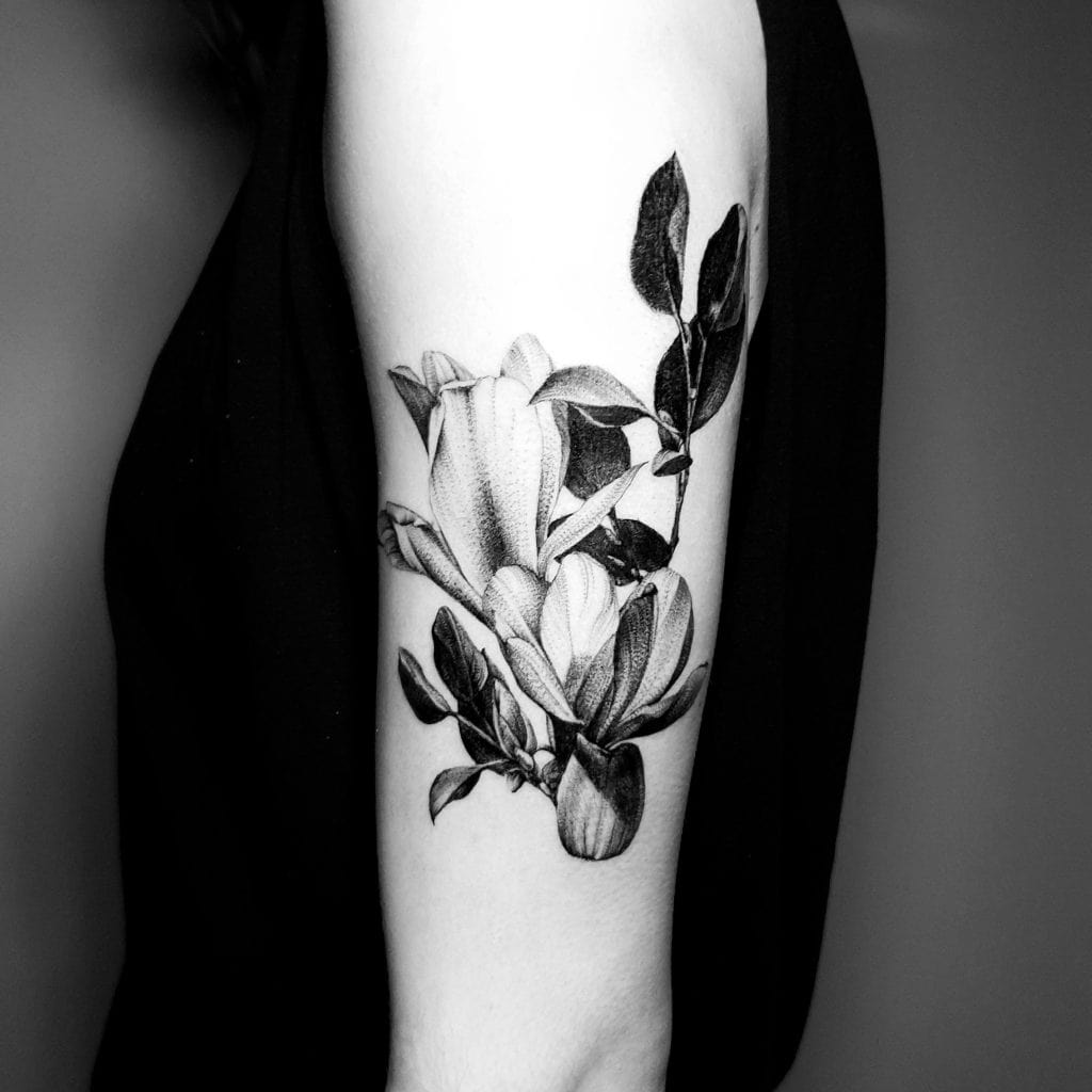 delicate magnolia tattoo