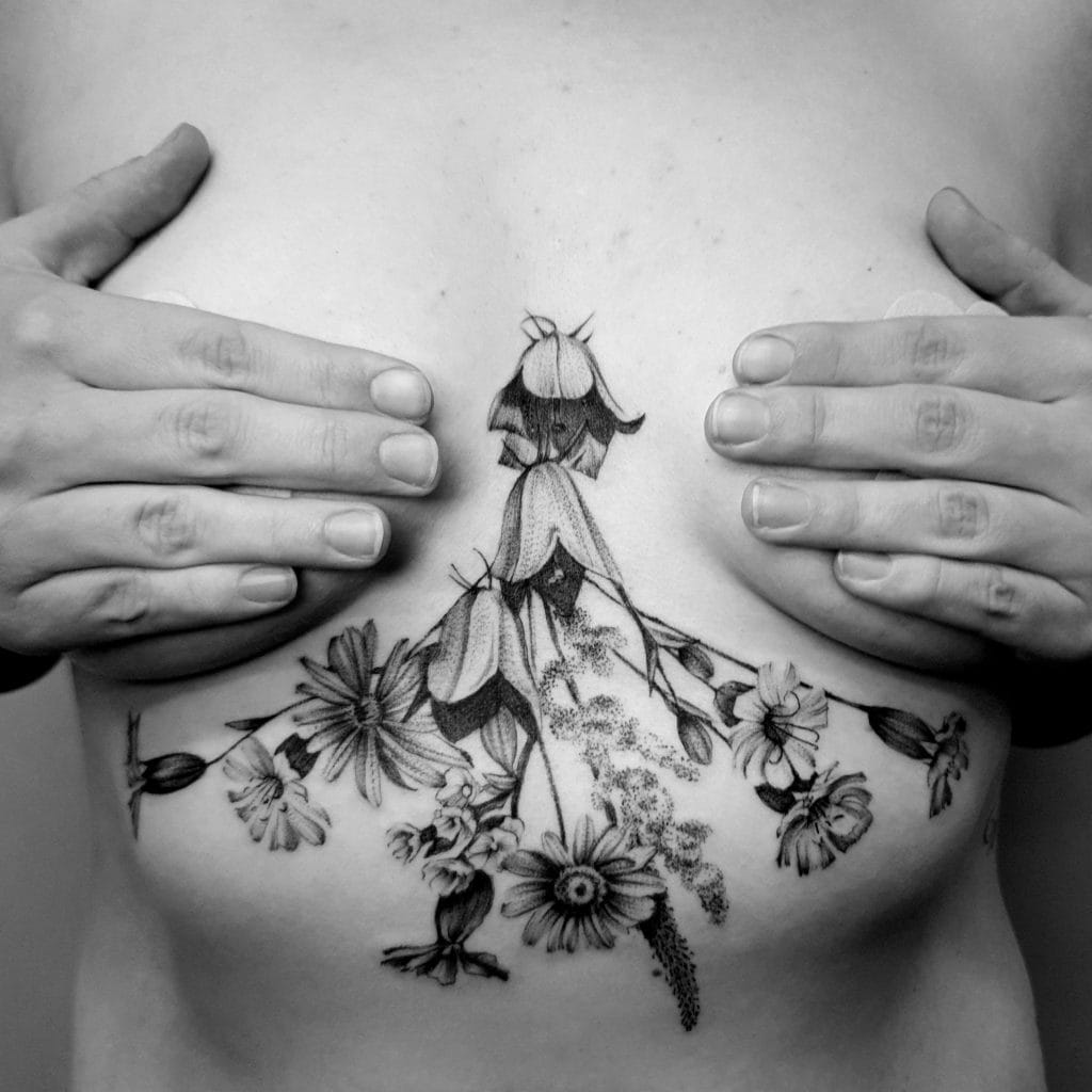 wildflower sternum floral tattoo