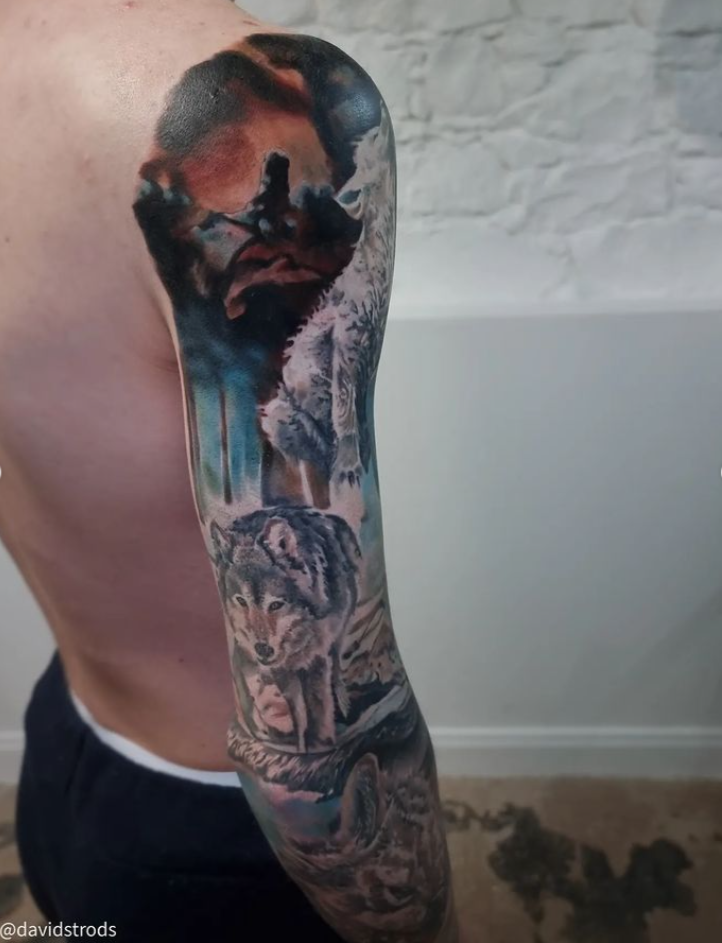 Back of arm view of this wolf themed tattoo sleeve.